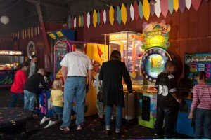 Guests enjoying the arcade games at Big Wheel Roller Skating Center. 